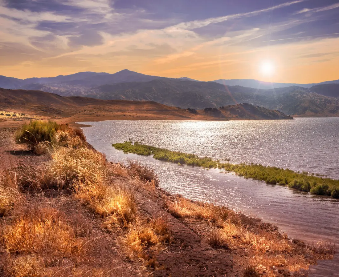 Property management Scottsdale AZ scenic desert lake with mountains and sunset landscape